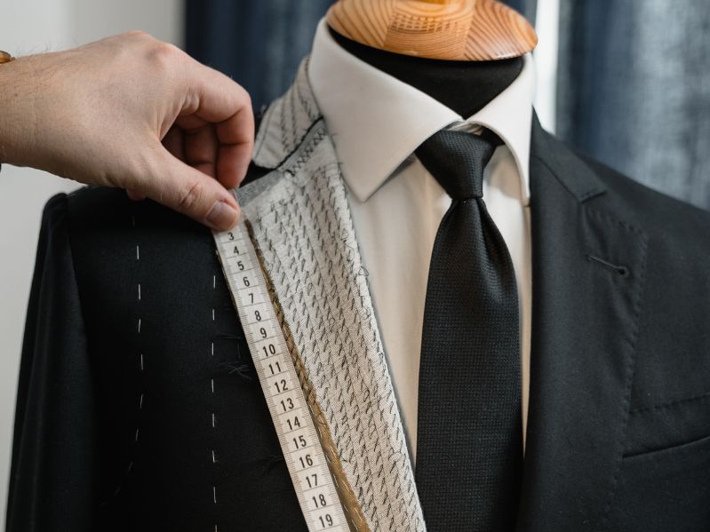 a jacket lapel being measured up